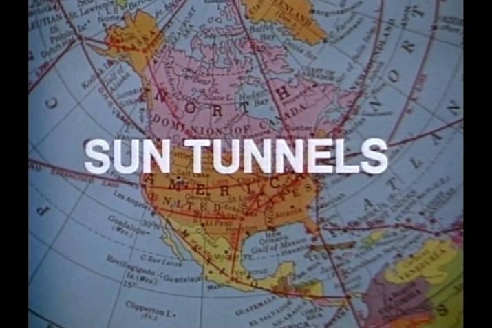 OPening shot from the Holt film Sun Tunnels showing the title text on a map of the USA.