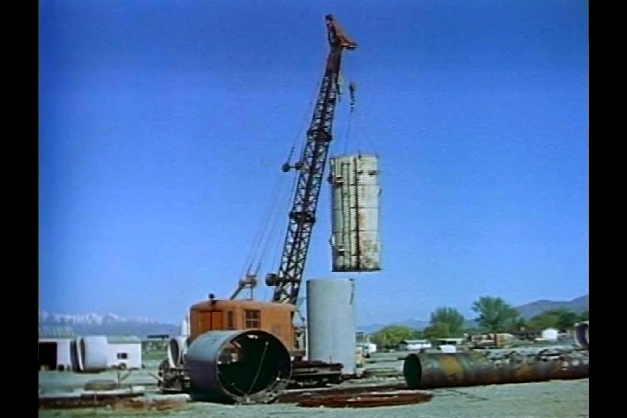 A film still from the construction of Holt's Sun Tunnels from the film, Sun Tunnels.