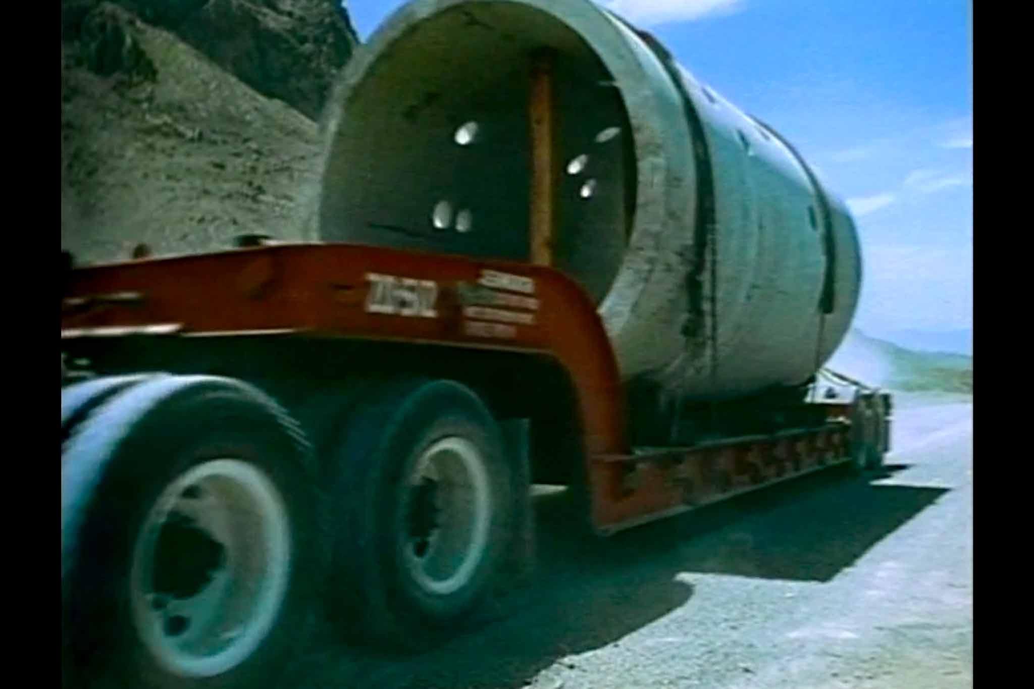 A film still of the construction of Holt's Sun Tunnels from the film, Sun Tunnels.