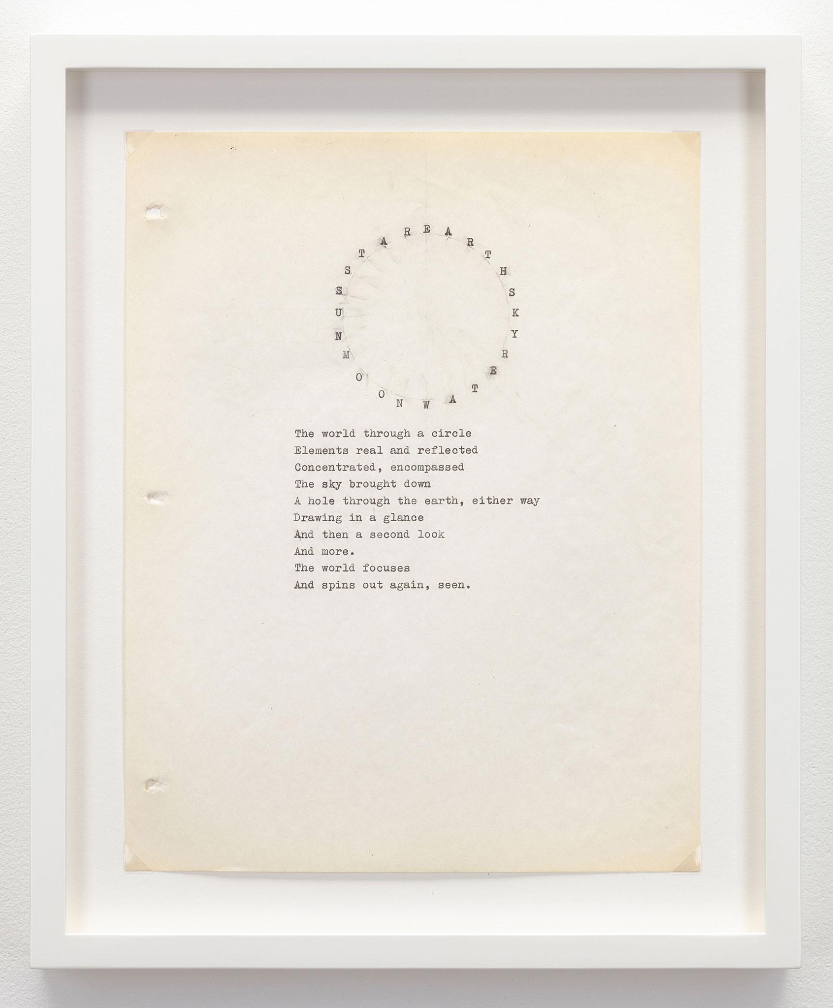 framed typewritten paper with words in a circle shape above a paragraph poem
